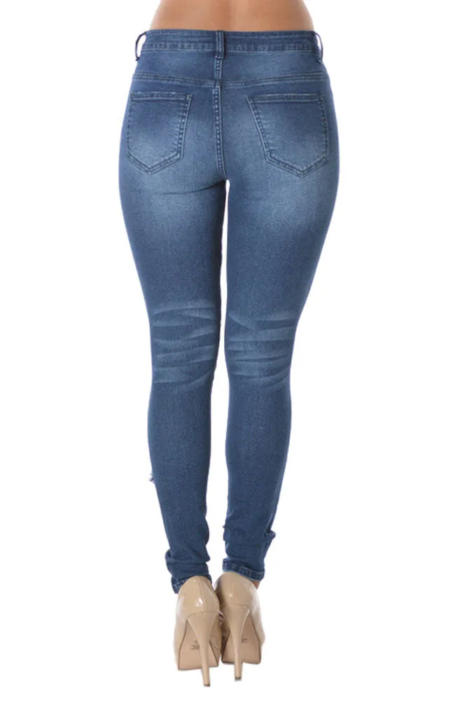 Ripped Roll-Up Skinny Jeans